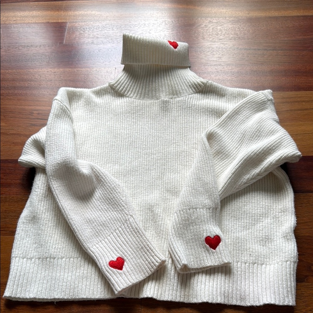 White Turtleneck Sweater with Red Heart Accents